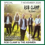 Rob Clamp & the band standing in a field, Rob is in front with the other 4 band members standing behind him.